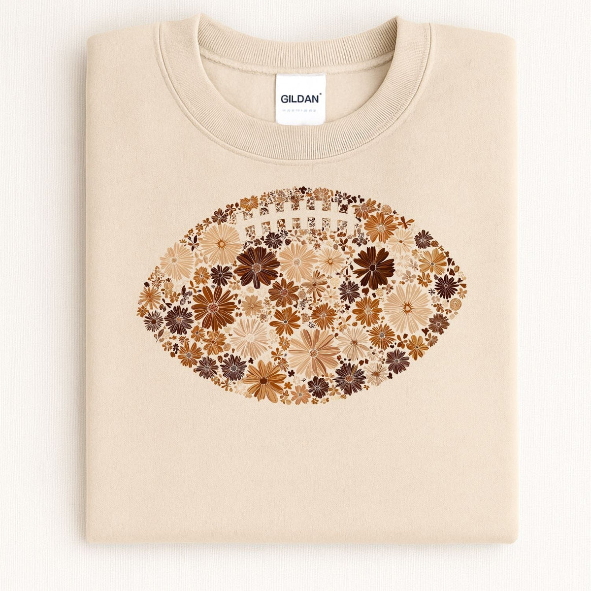 Sand Gildan 18000 sweatshirt with a brown and orange floral football design