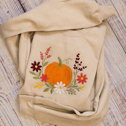 Sand floral pumpkin embroidered Gildan Softstyle sweatshirt folded view