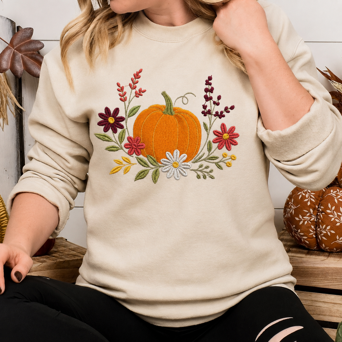 Sand floral pumpkin embroidered Gildan Softstyle sweatshirt lifestyle view