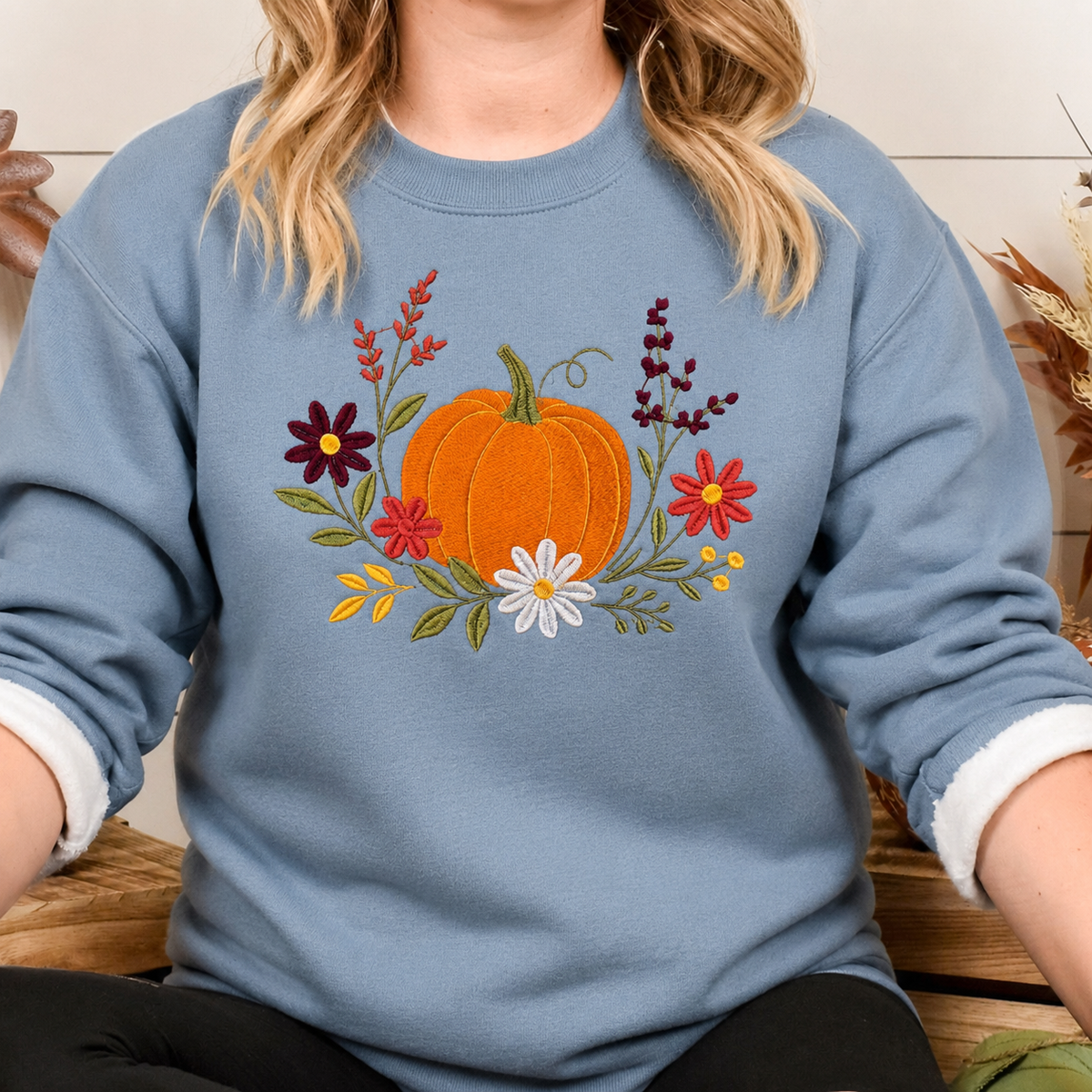 Stone Blue floral pumpkin embroidered Gildan Softstyle sweatshirt lifestyle view