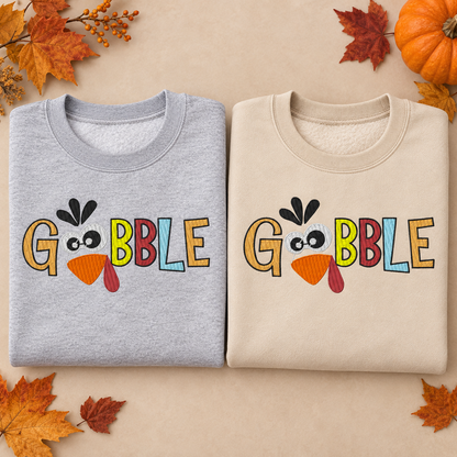 Sport Grey and Sand Gobble turkey embroidered sweatshirts shown together