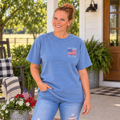 Samantha wearing a Chambray Comfort Colors tee with God Bless the USA left-chest embroidery