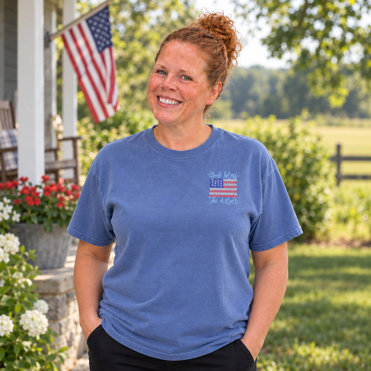 Samantha wearing a Blue Jean Comfort Colors 1717 tee with God Bless the USA flag embroidery