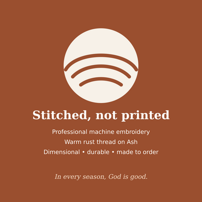 Product details for professionally embroidered God Is Good fall sweatshirt in rust thread on Ash
