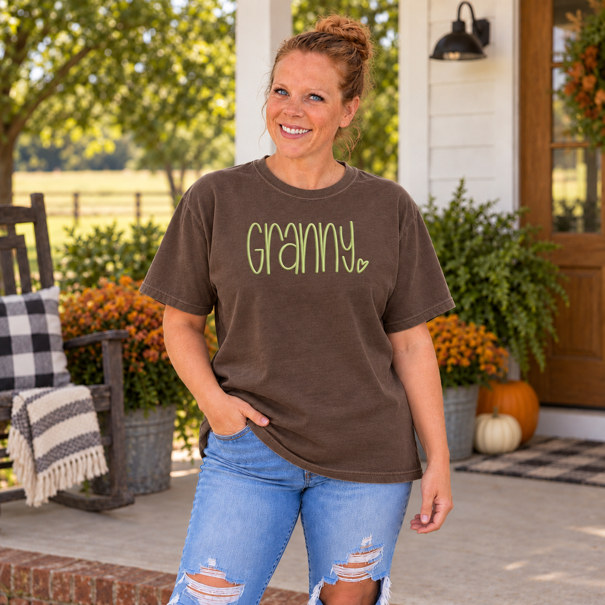 Samantha wearing an Espresso Comfort Colors tee with light lime Granny embroidery