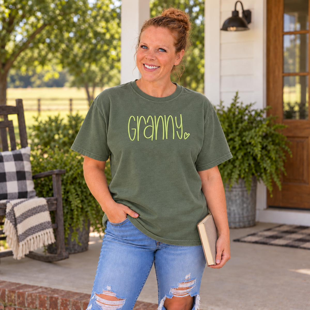 Samantha wearing a Moss Comfort Colors tee with light lime Granny embroidery