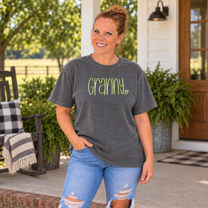 Samantha wearing a Pepper Comfort Colors tee with light lime Granny embroidery