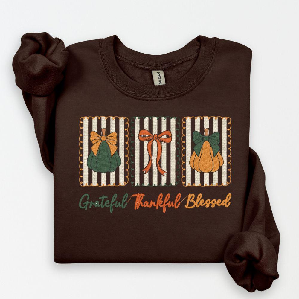 Brown Gildan Heavy Blend sweatshirt with Grateful Thankful Blessed pumpkin and bow embroidery