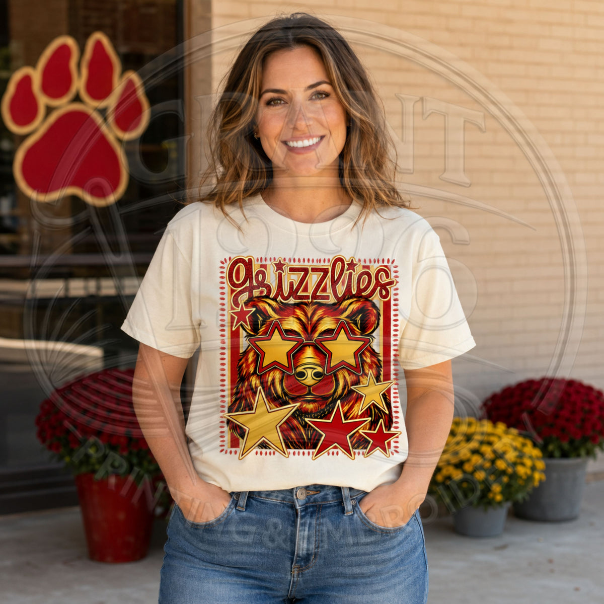 Woman wearing ivory Labette County Grizzlies Comfort Colors T-shirt with star sunglasses bear mascot