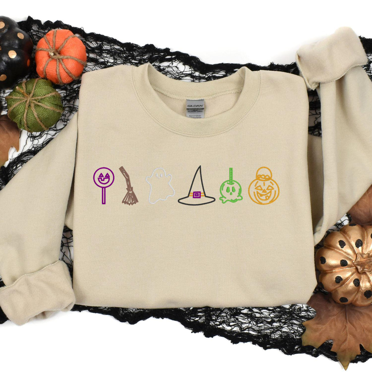 Sand Halloween candy icons sweatshirt styled with pumpkins and black lace