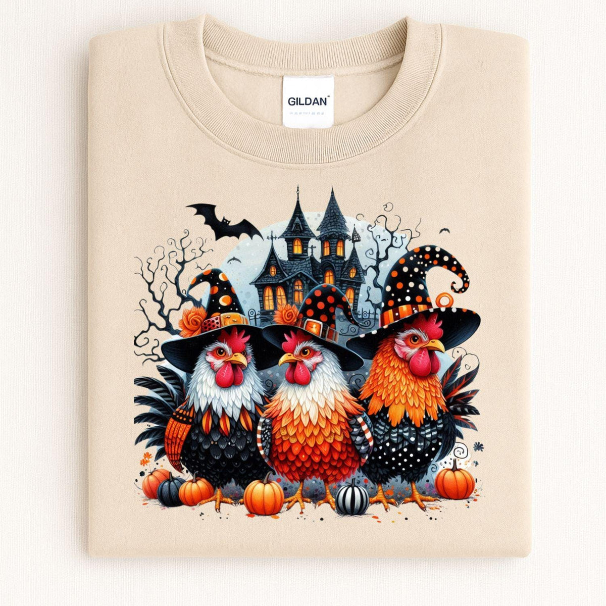 Sand Halloween chickens and haunted house sweatshirt folded flat