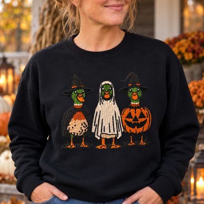 Close detail of raised Halloween Duck embroidery on a Black sweatshirt