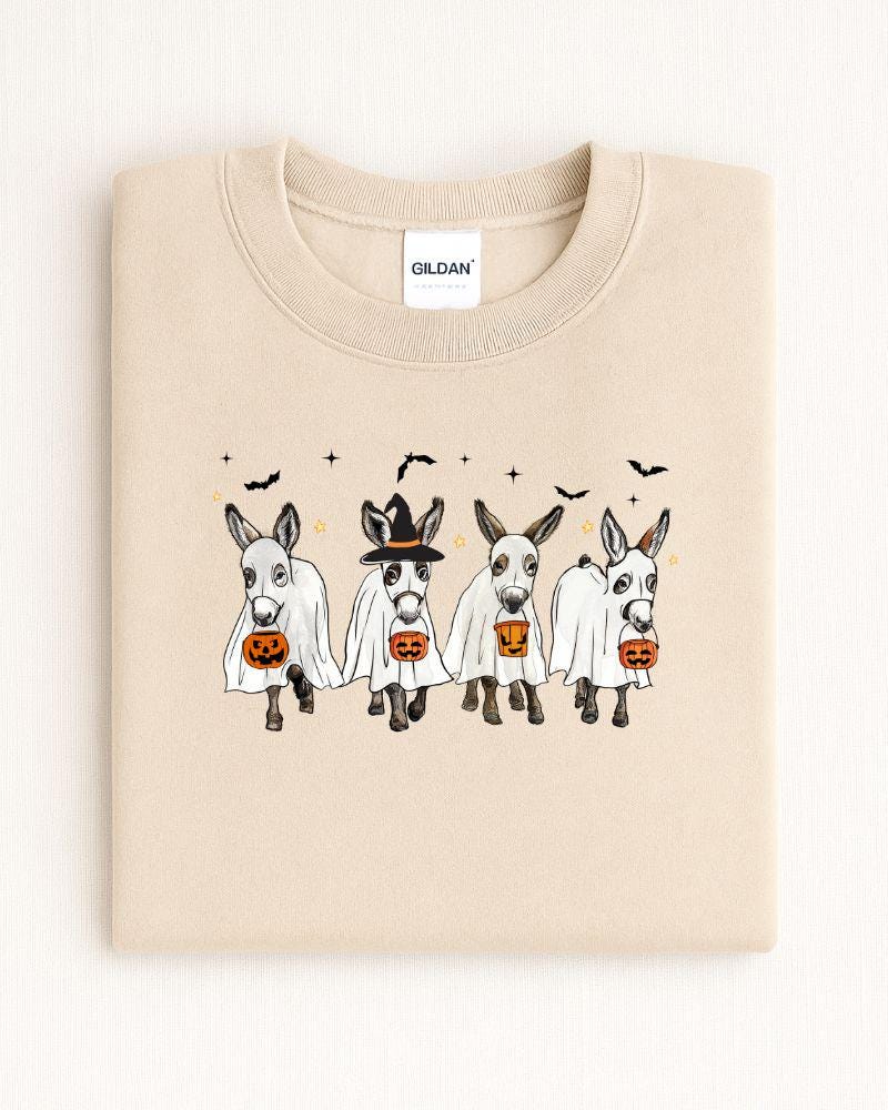 Sand Gildan Heavy Blend sweatshirt with four ghost donkeys carrying Halloween pumpkin buckets