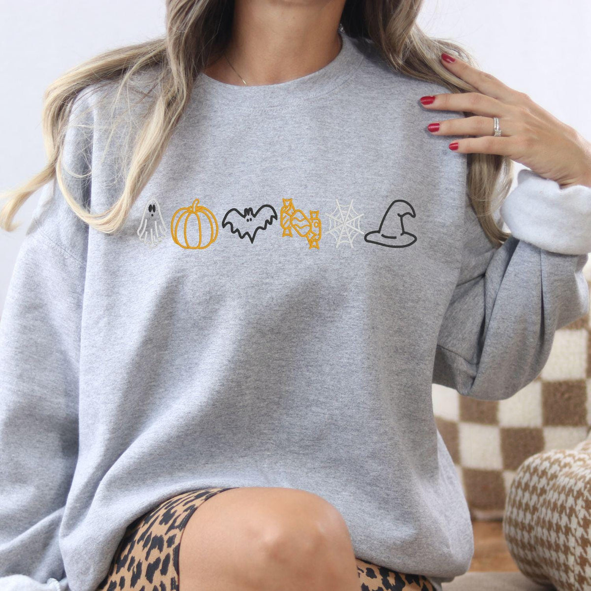 Ash Halloween icons embroidered sweatshirt with a colorful spooky line design