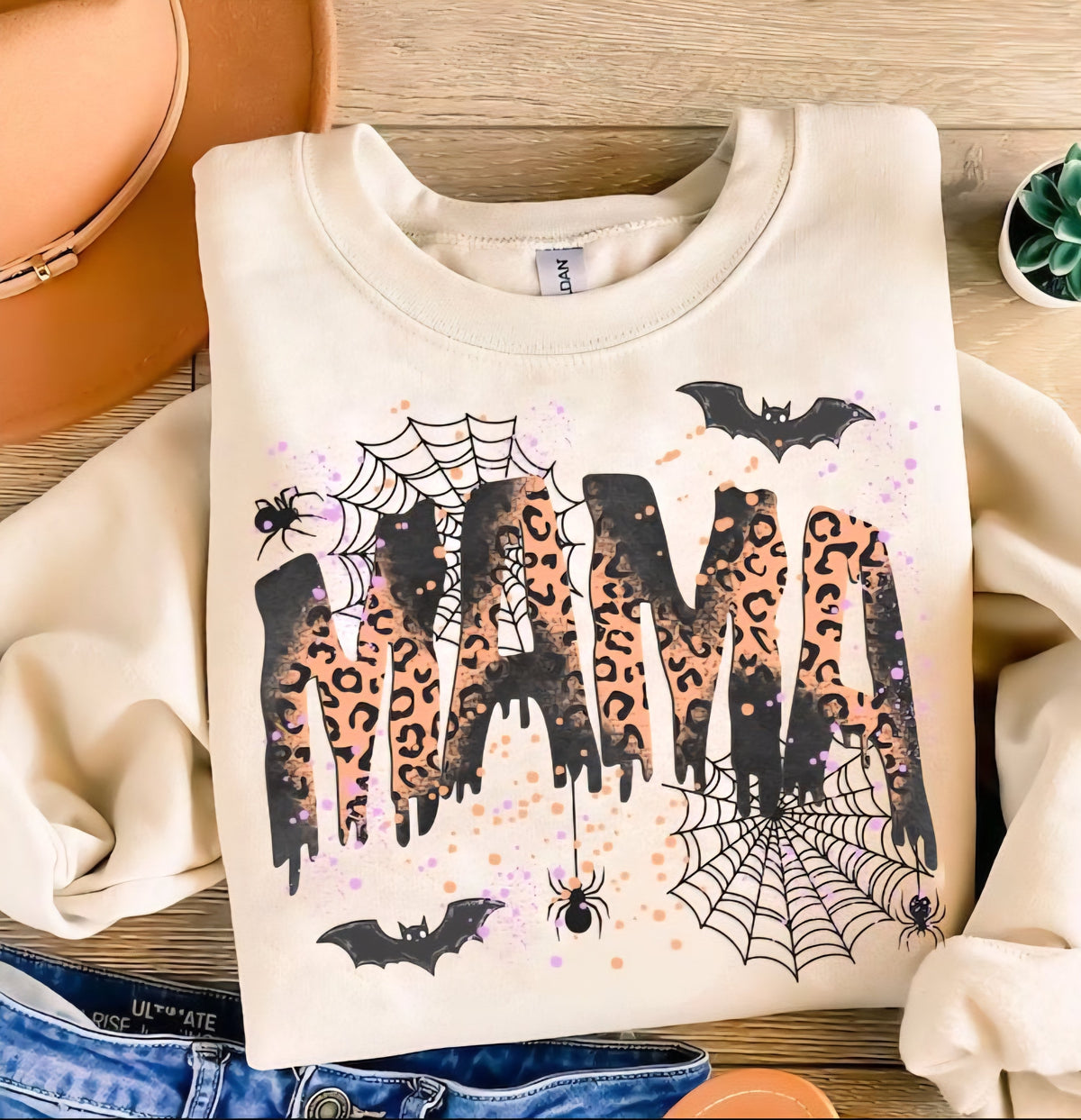 Sand Halloween mama sweatshirt flat lay styled with warm fall accessories