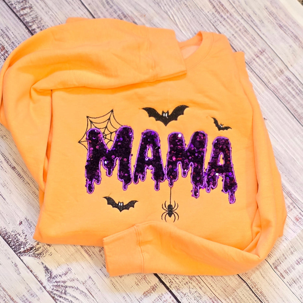 Real Tultex 340 Cantaloupe Halloween MAMA sweatshirt with purple and black sequin appliqué, bats, spiderweb, and spider