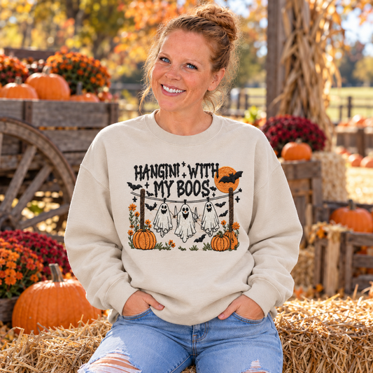 Woman wearing Sand Hanging With My Boos embroidered sweatshirt at a pumpkin patch