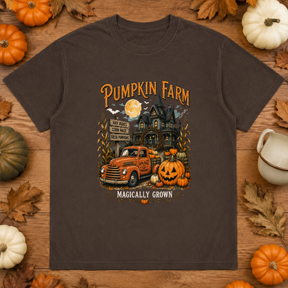 Espresso Comfort Colors haunted house pumpkin shirt flat lay with fall leaves and pumpkins