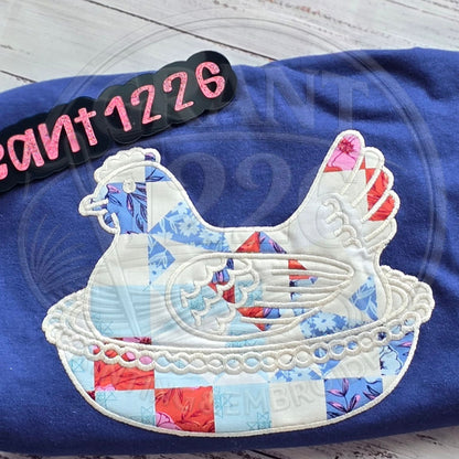 Folded blue Comfort Colors patchwork hen applique shirt