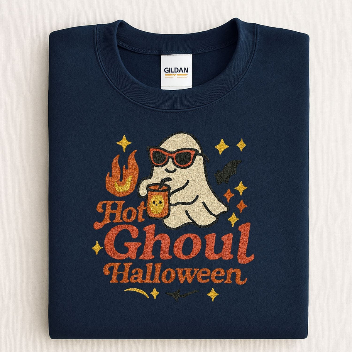 Folded Navy Gildan sweatshirt with Hot Ghoul ghost embroidery