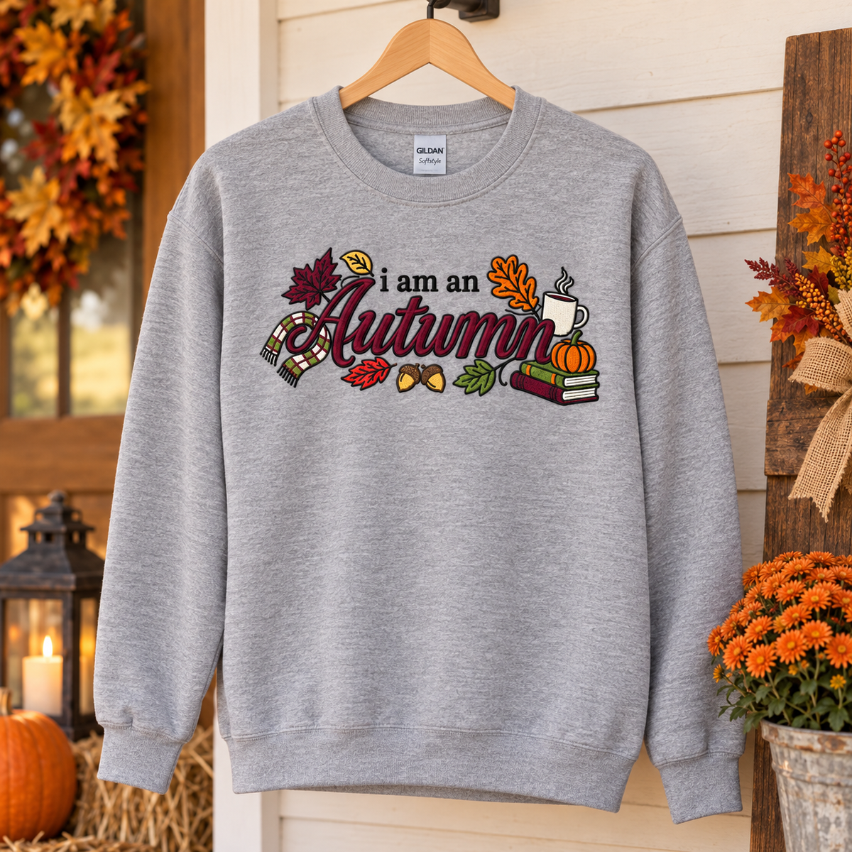 Sport Grey embroidered I Am an Autumn sweatshirt on a hanger