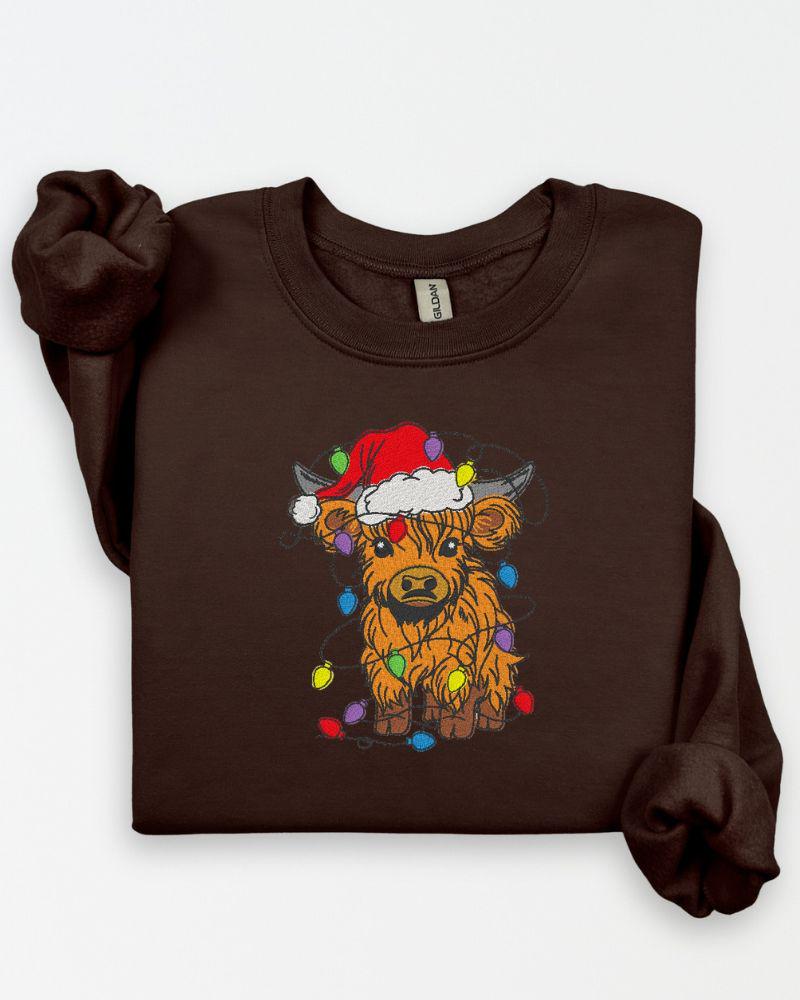 Highland Cow Christmas Sweatshirt – Embroidered Santa Hat Holiday Crewneck – Cozy Farmhouse Animal Lover Sweater Gift