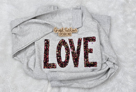 Love sequin embroidered Valentine sweatshirt on neutral crewneck