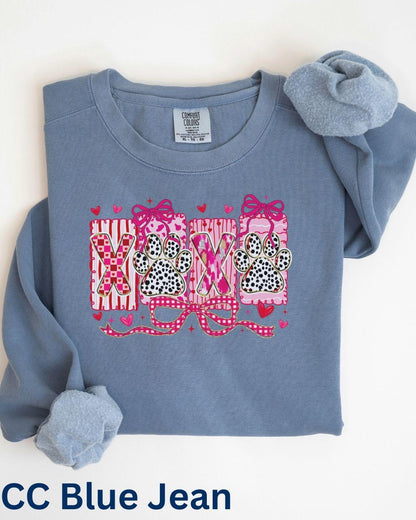 Close-up of XOXO paw print graphic on dog mom Valentine t-shirt