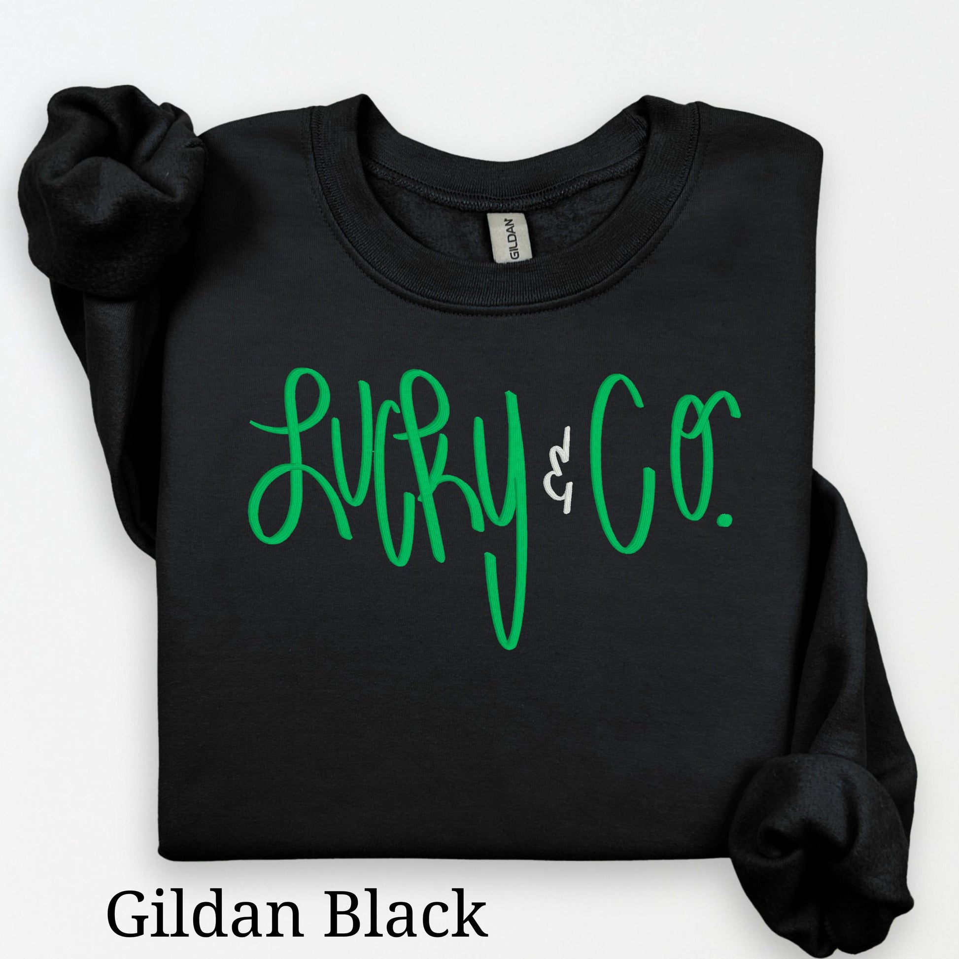 black St. Patrick’s Day crewneck with embroidered shamrock design