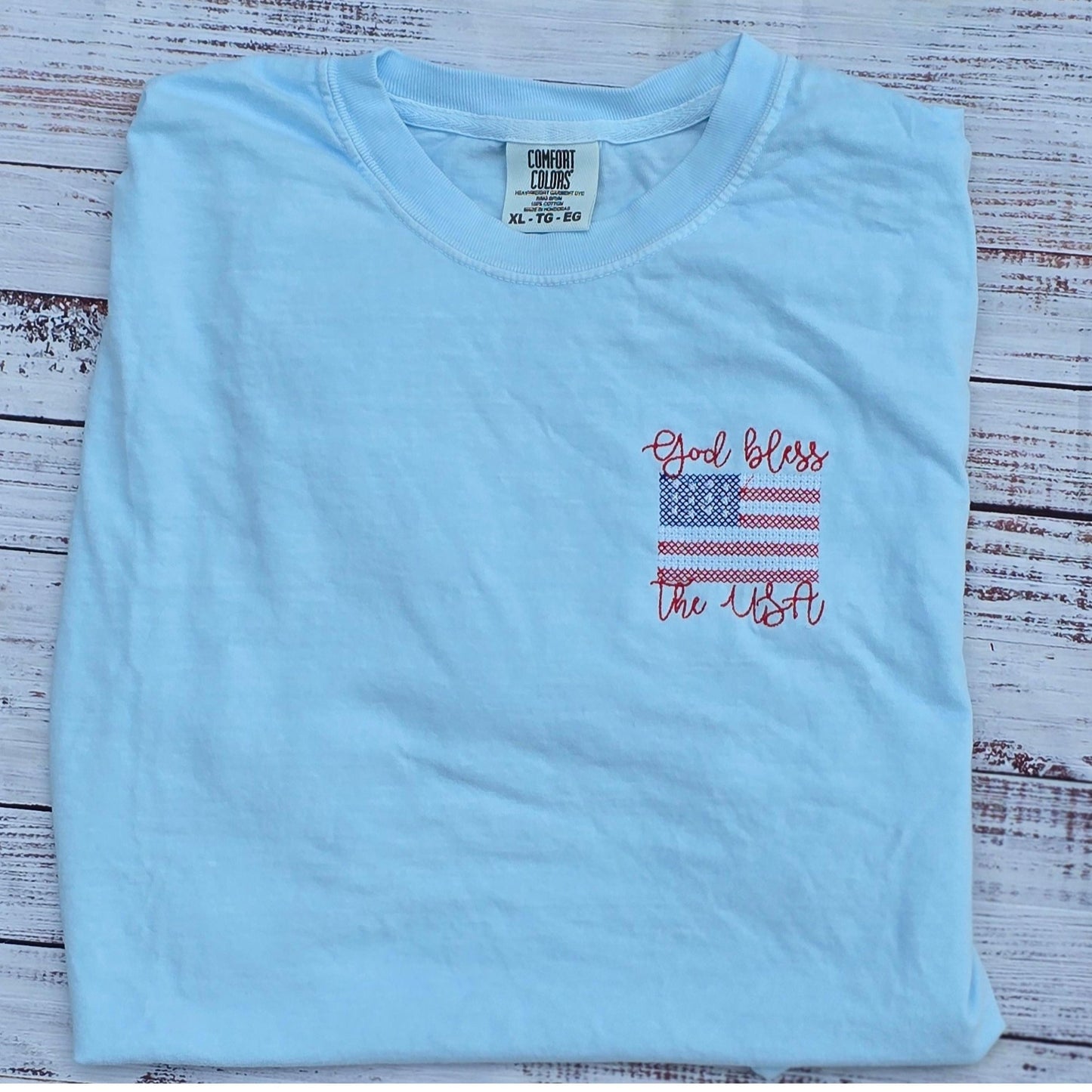Chambray Comfort Colors shirt with embroidered God Bless the USA American flag design