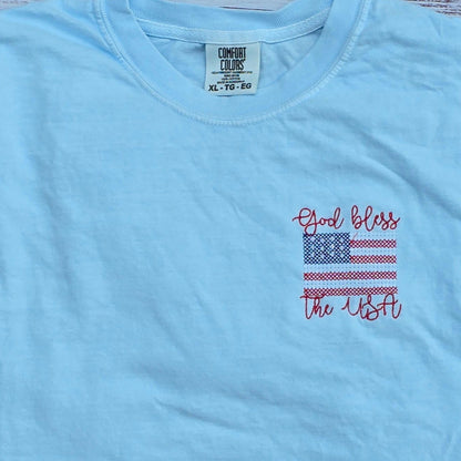Close up of God Bless the USA embroidery with patriotic American flag stitching