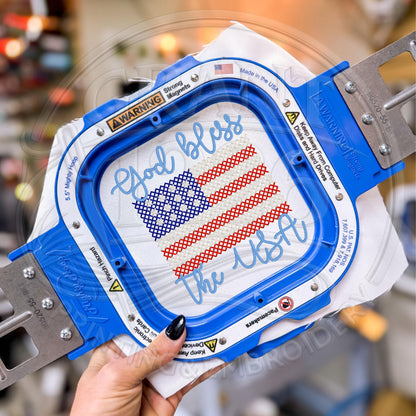 Embroidery machine stitching God Bless the USA patriotic flag design