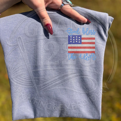 Comfort colors blue jean with cross stitch flag on left chest
