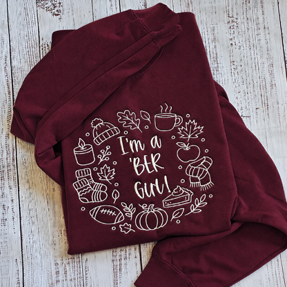Maroon sweatshirt mockup with cream I’m a BER Girl fall embroidery