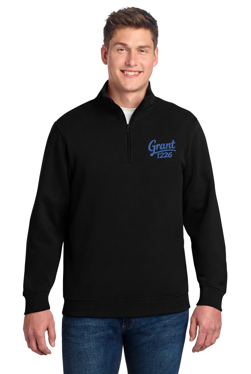 Black Sport-Tek quarter-zip pullover mockup with blue Grant 1226 left-chest embroidery