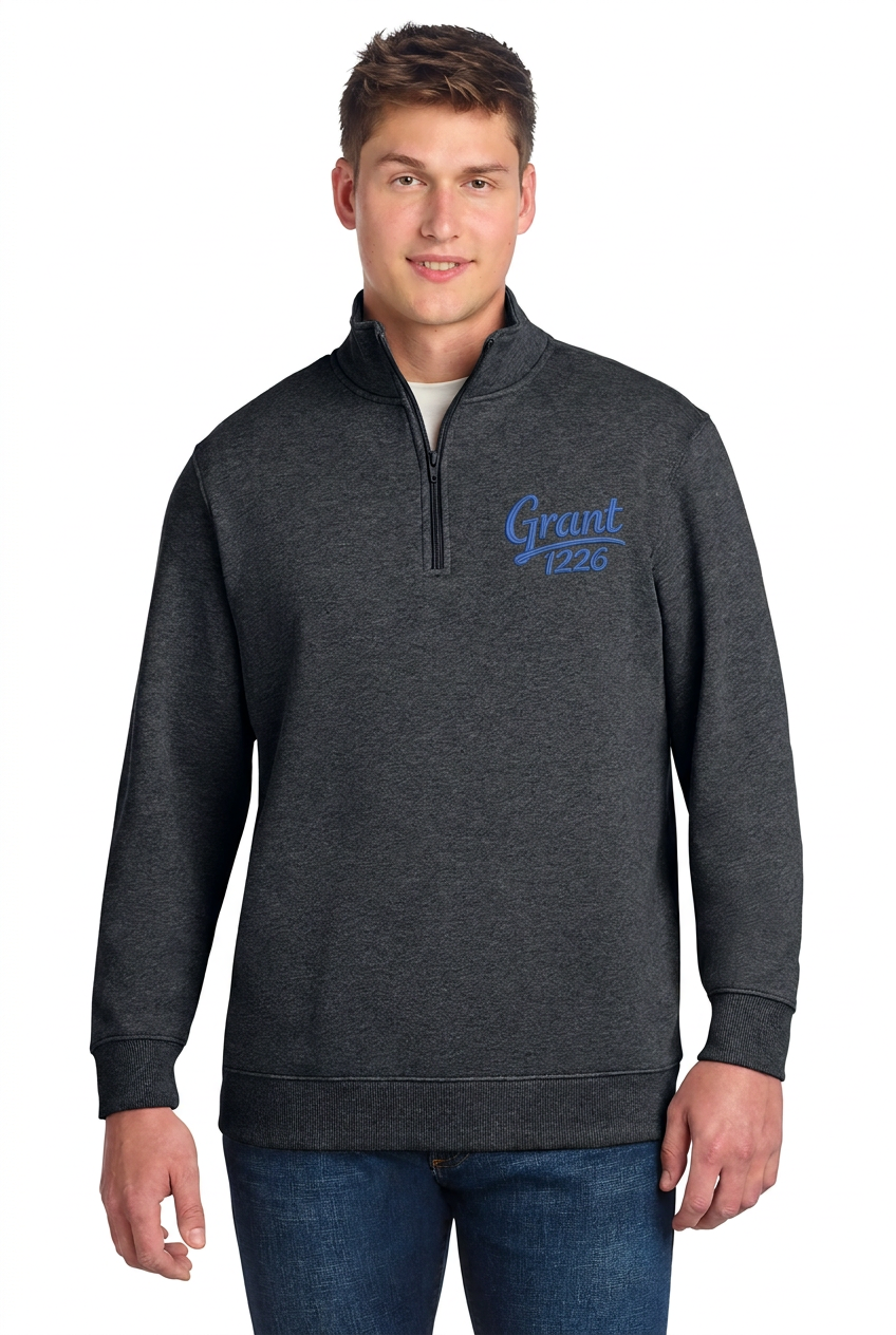 Graphite Heather quarter-zip fleece pullover mockup with blue Grant 1226 left-chest embroidery