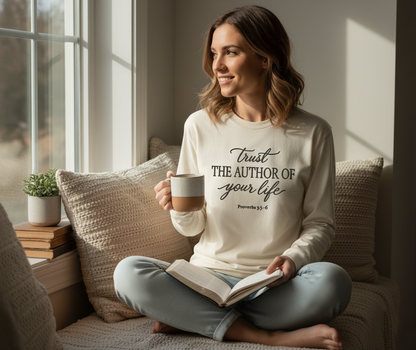 Ivory long sleeve tshirt with Christian embroidery.