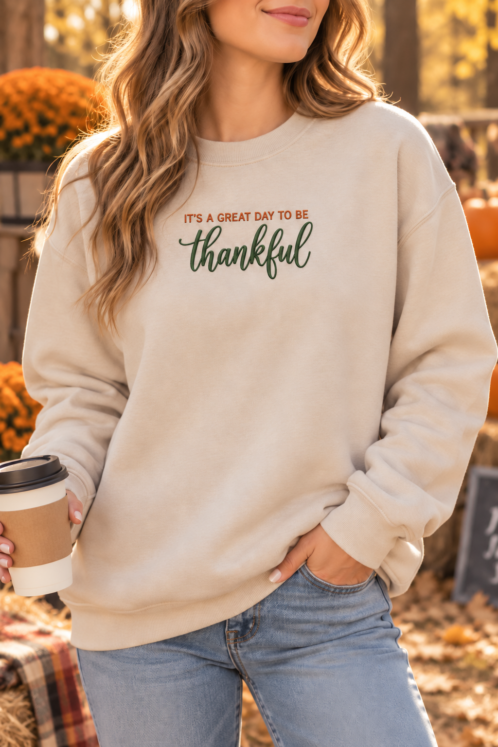 Woman wearing Sand It’s a Great Day to Be Thankful embroidered sweatshirt