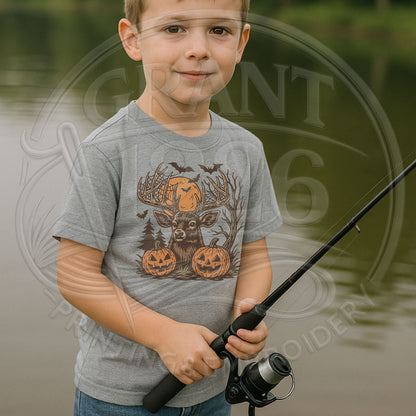 Child wearing gray deer and pumpkin Halloween T-shirt outdoors