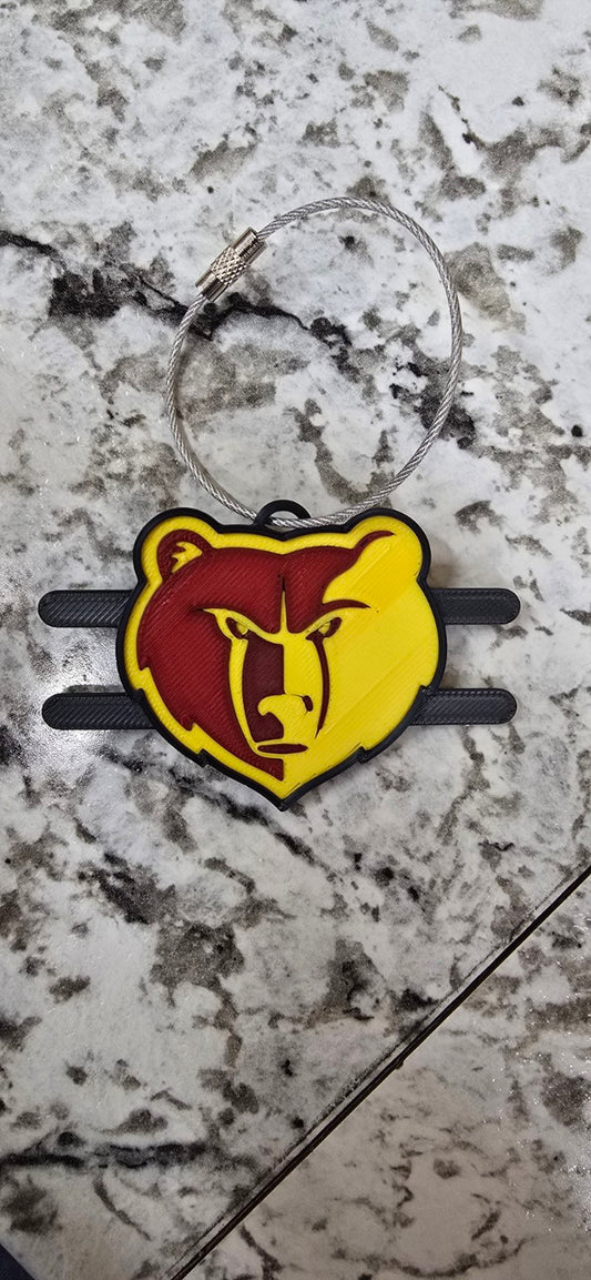Maroon, yellow, and black Labette County Grizzlies bear hair tie holder