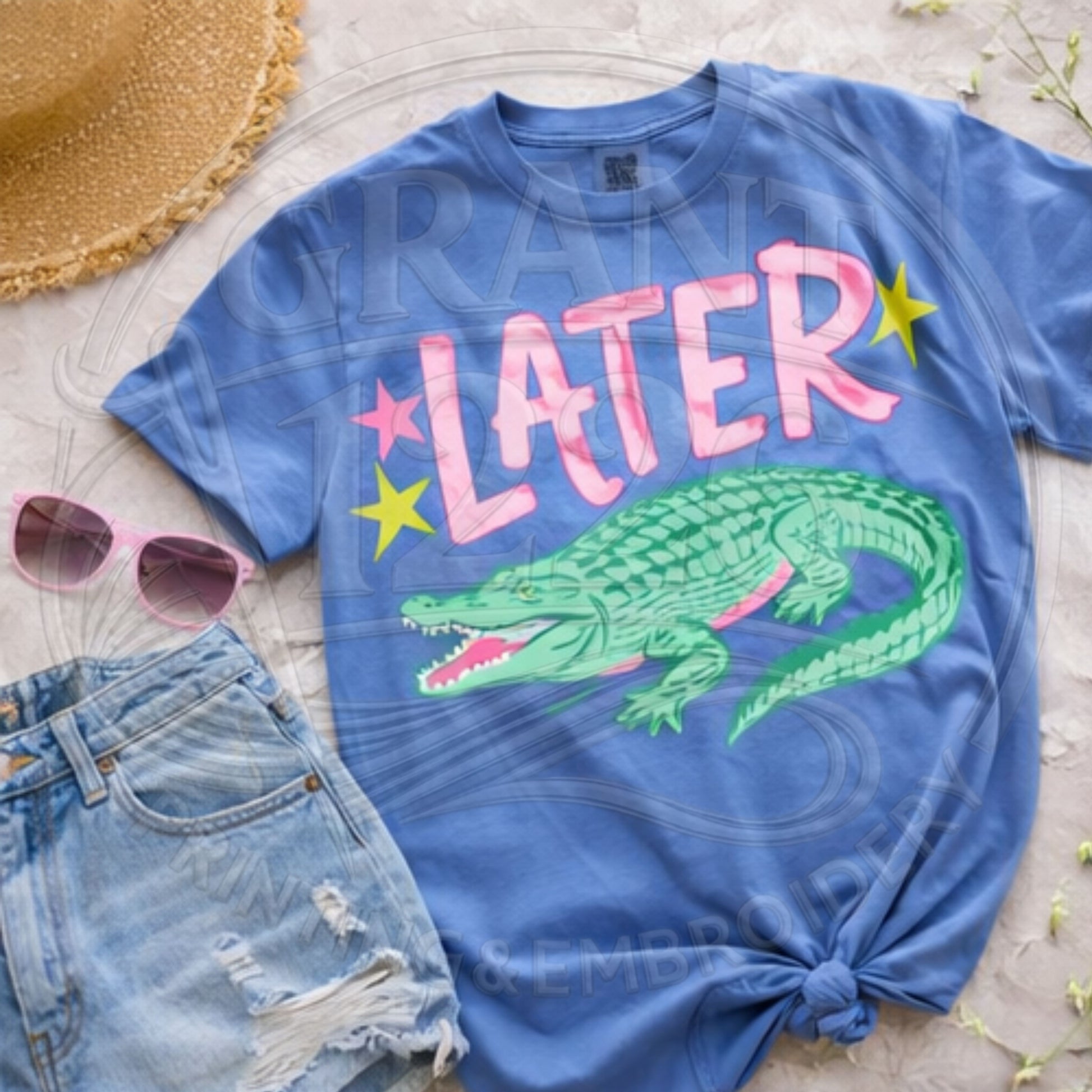 trendy later gator graphic tee styled with denim shorts and sunglasses