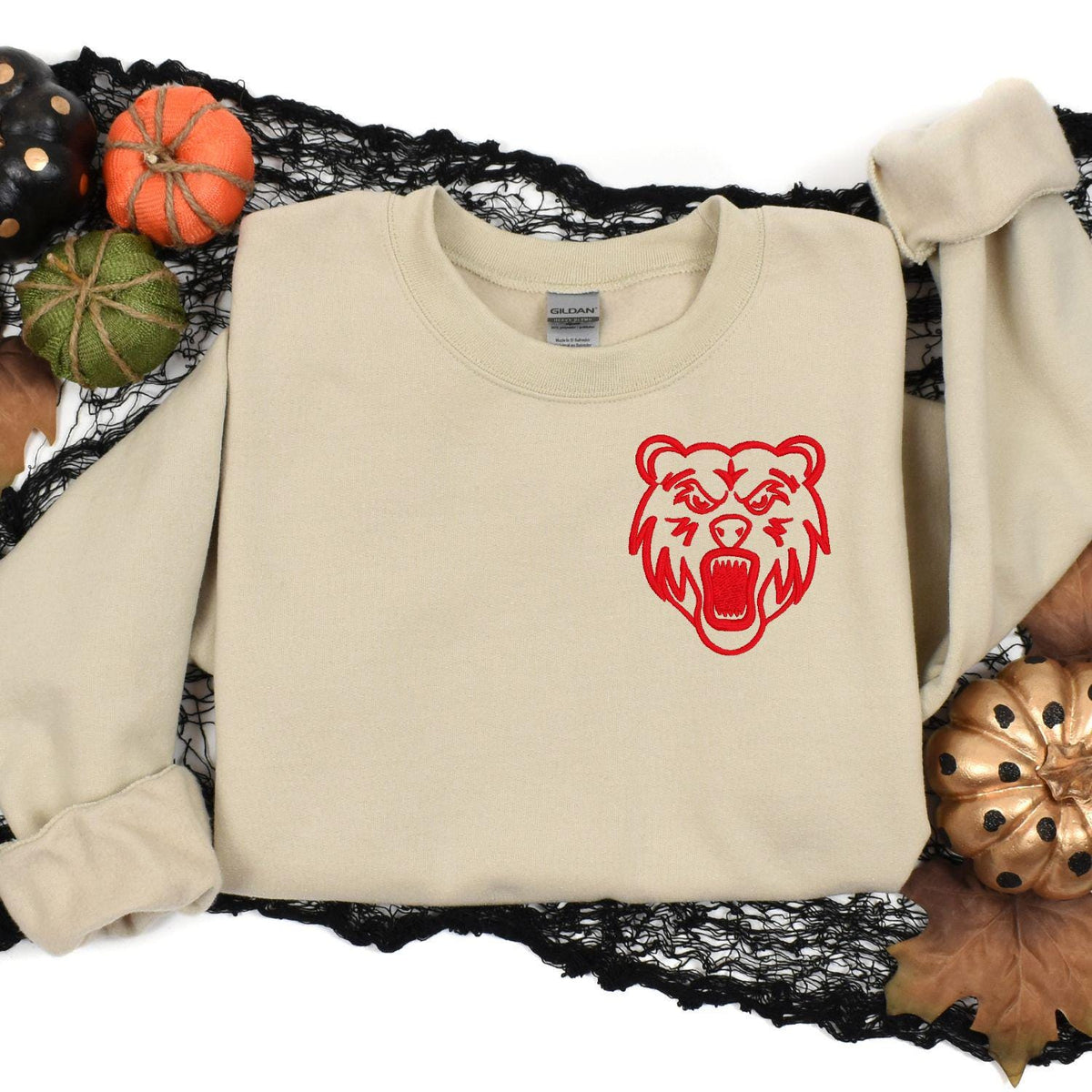 Sport gray left-chest bear mascot sweatshirt modeled indoors