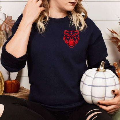Navy sweatshirt with red left-chest bear mascot embroidery modeled indoors