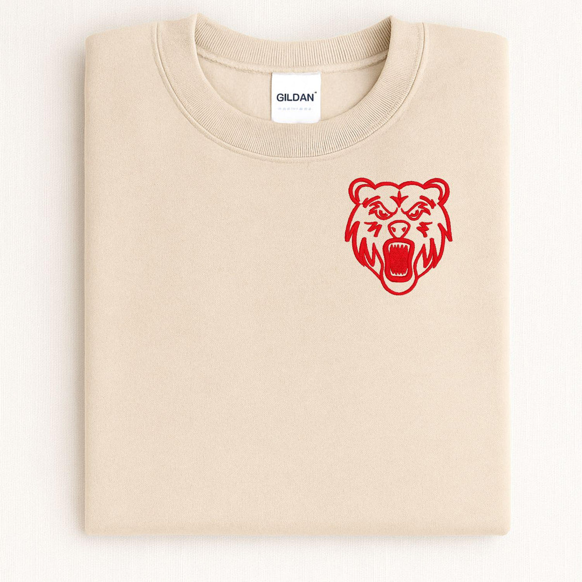 Sand left-chest bear mascot crewneck styled with fall pumpkins and black lace