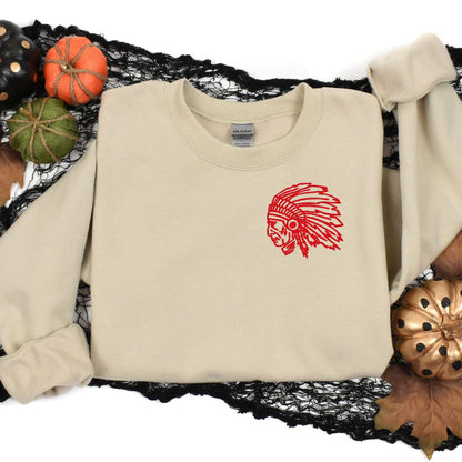 Sand left-chest headdress mascot sweatshirt styled with fall pumpkins