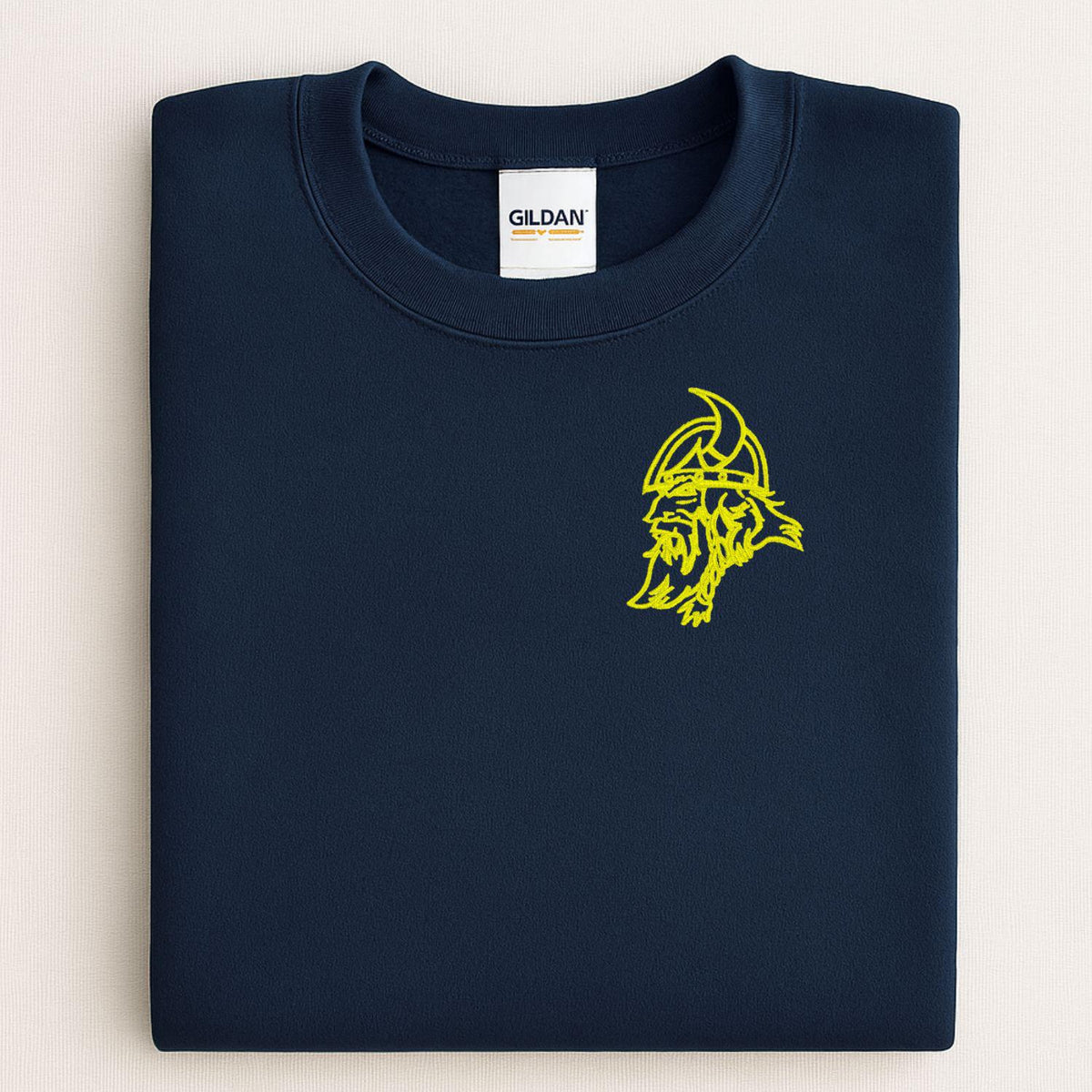 Navy sweatshirt with neon yellow left-chest Viking mascot embroidery folded flat
