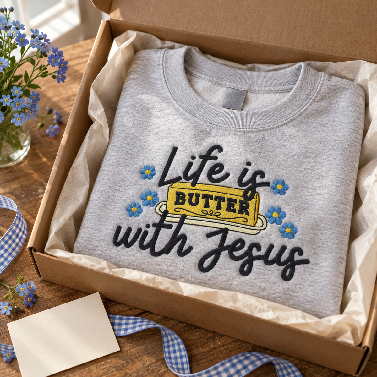 Ash Life Is Butter With Jesus embroidered sweatshirt packaged in a kraft gift box