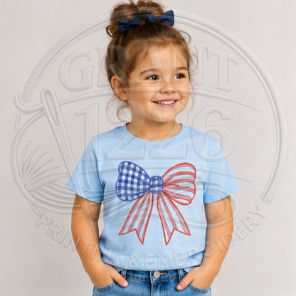Child wearing Light Blue embroidered patriotic gingham bow shirt