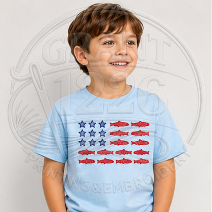 Light blue youth shirt with patriotic embroidered fish flag design.