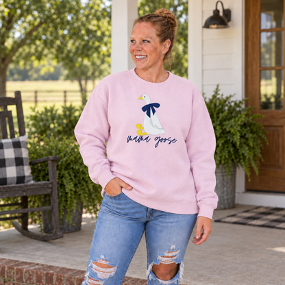 Mama Goose embroidered Gildan Softstyle sweatshirt modeled by Samantha on a green farmhouse porch